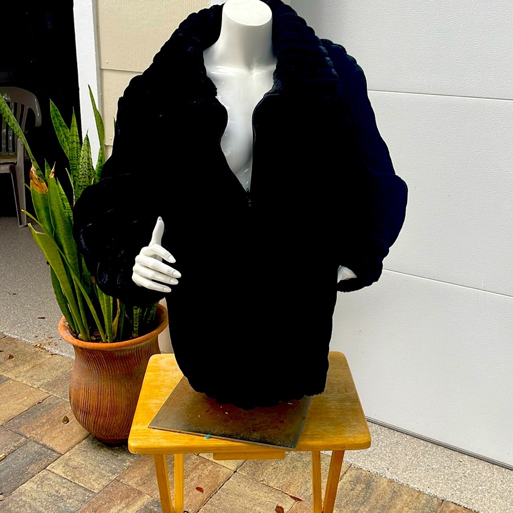 Reversible faux fur jacket with nylon liner